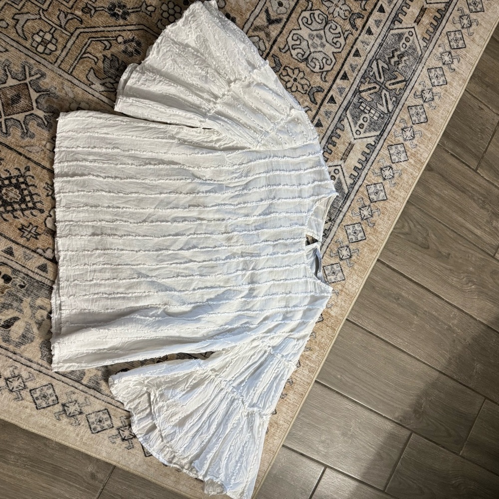 White flowy top
